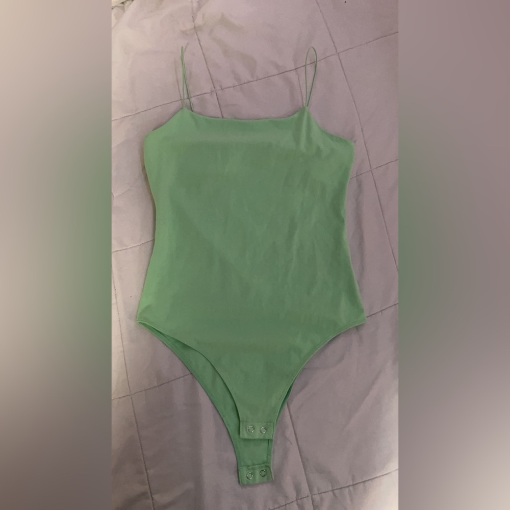 Light green simple bodysuit, good condition, barley worn, brighter color, medium